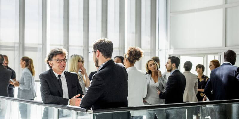 people talking at a conference